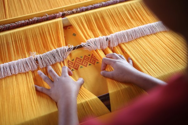 Où suivre des cours de tissage traditionnel en Équateur?
